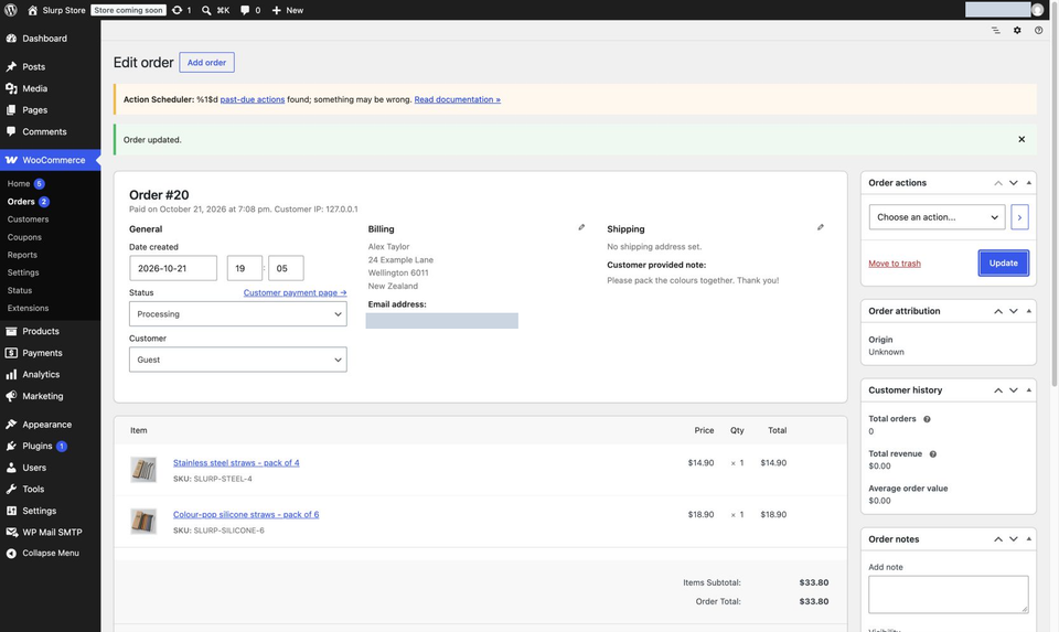 WooCommerce order editor with Order updated confirmation, Processing status, two straw products and a 33.80 dollar total