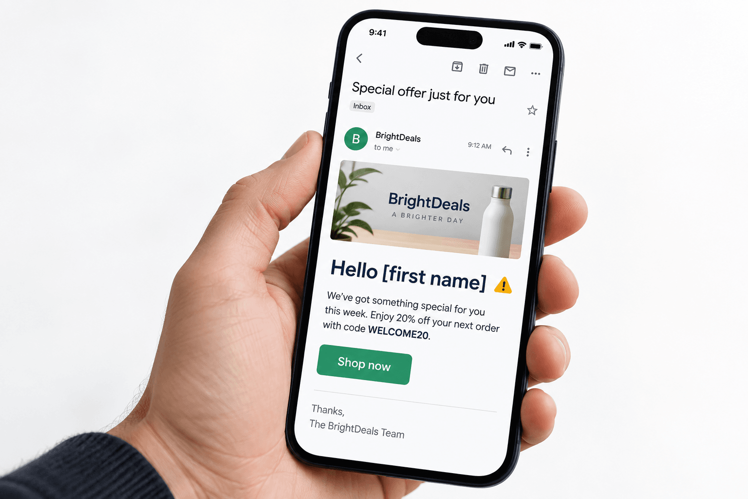 A person holding a phone with a Gmail message that still says Hello first name